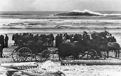 A wave breaks over the almost-submerged hull of the Mimi. Inside that hull are the bodies of drowned German sailors, trapped inside when the vessel capsized.